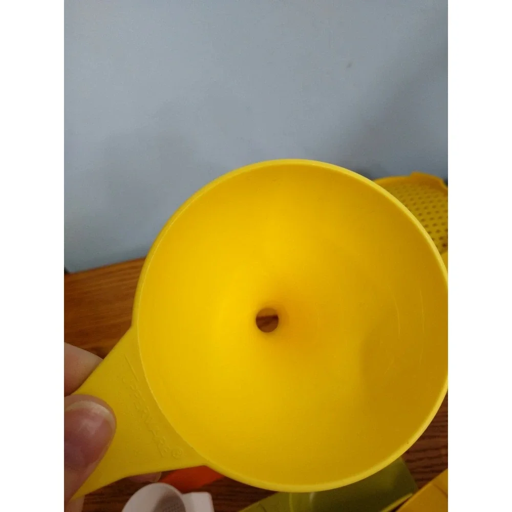 Tupperware lot #1200 strainer #1227 funnel #878 scoop #779 egg strainer#878 tea